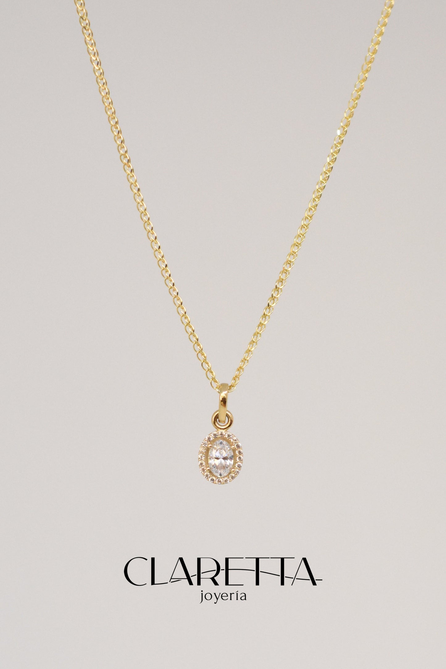 Dije de Oro 10k Ovalado con zirconita