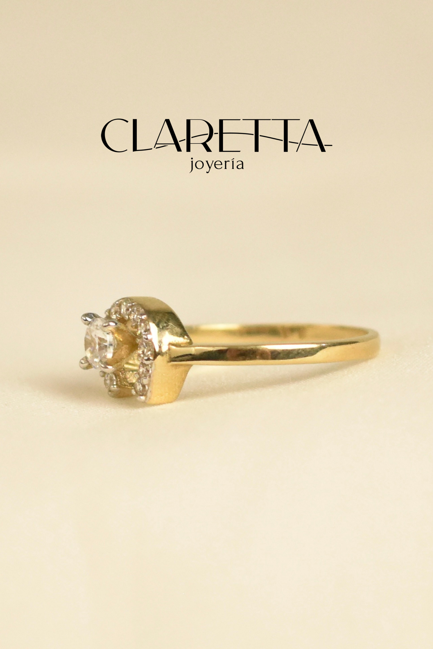 Anillo herradura con zirconias incrustadas oro 10k