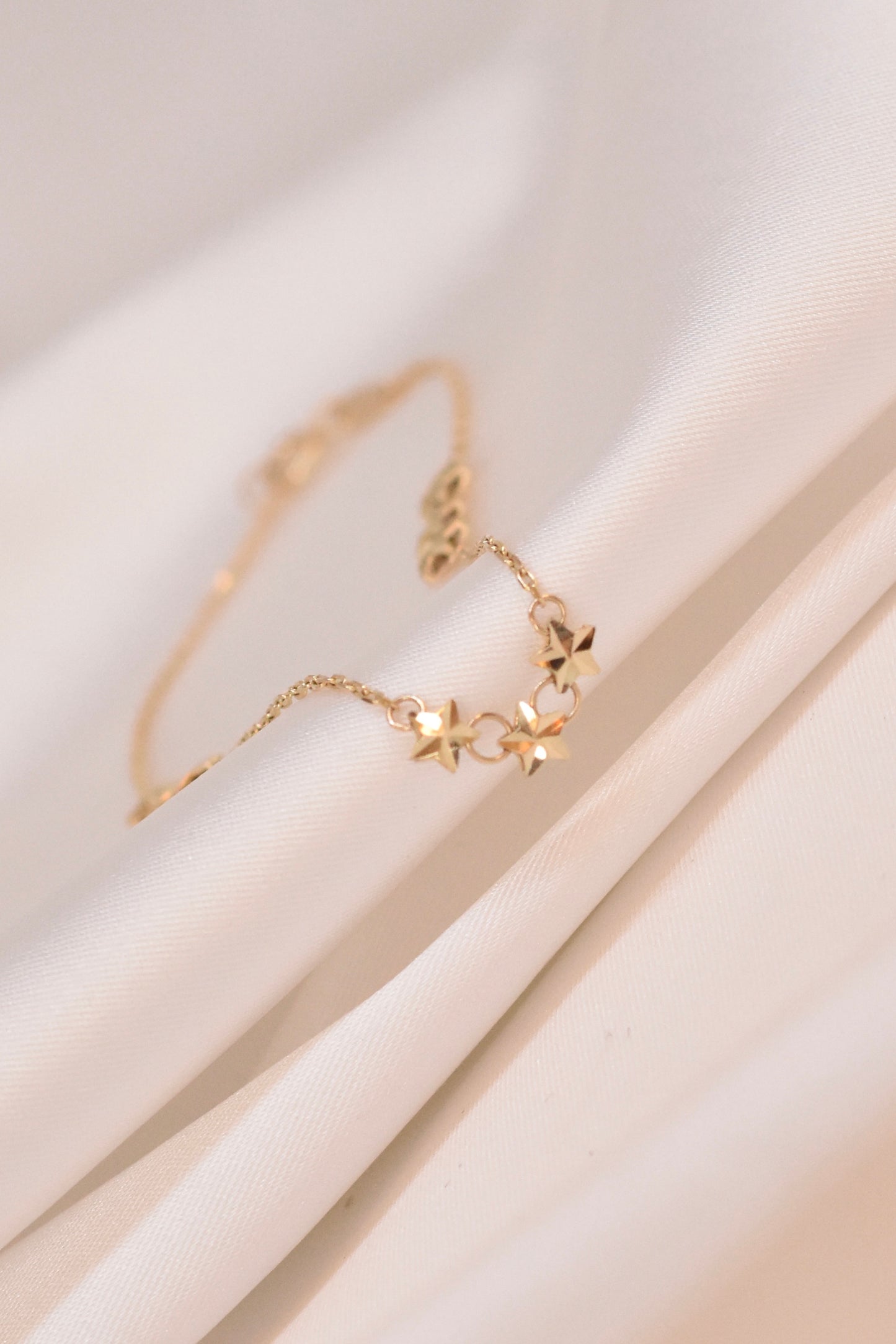 Pulsera con estrellas de oro 10k