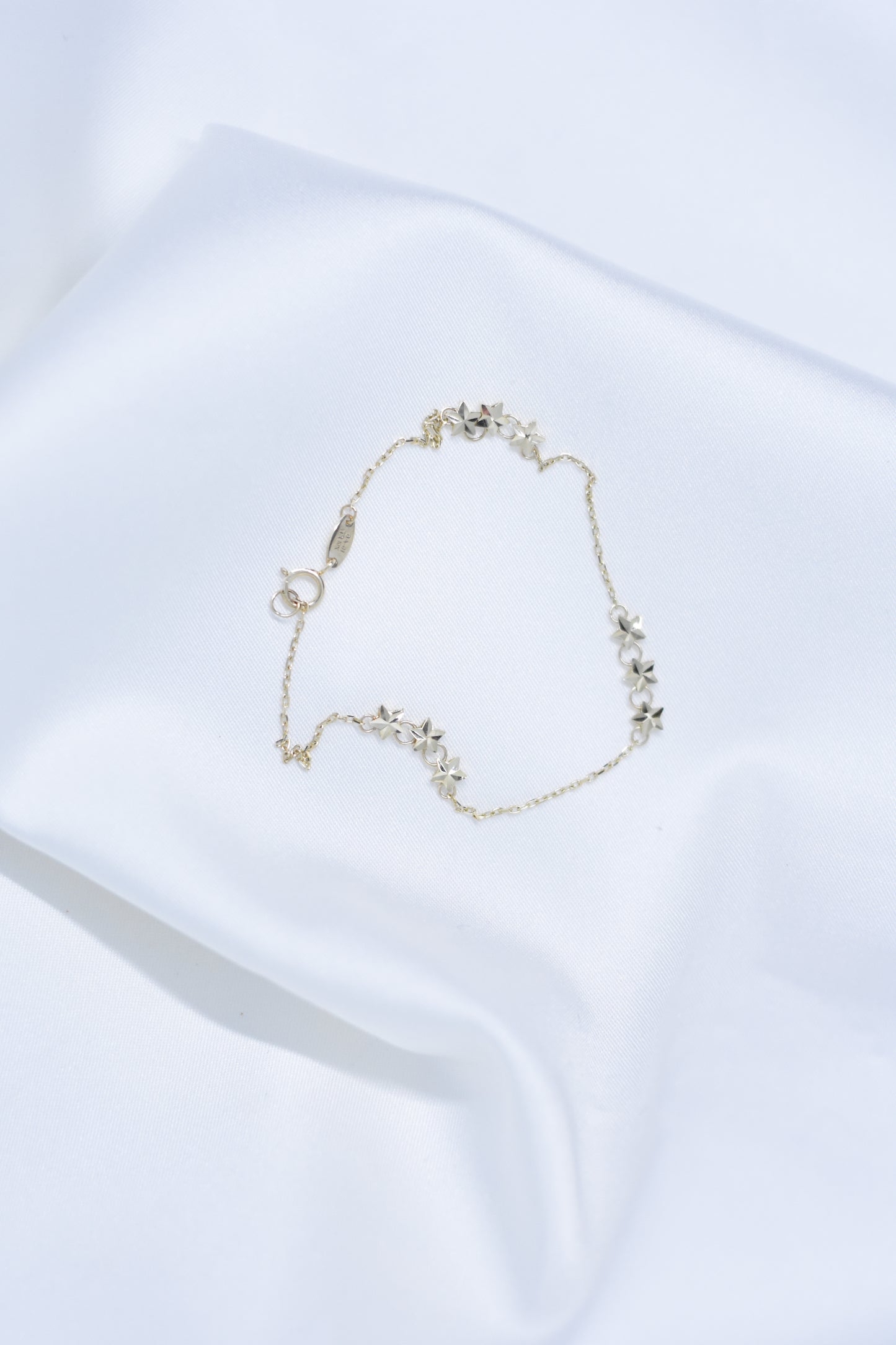 Pulsera con estrellas de oro 10k