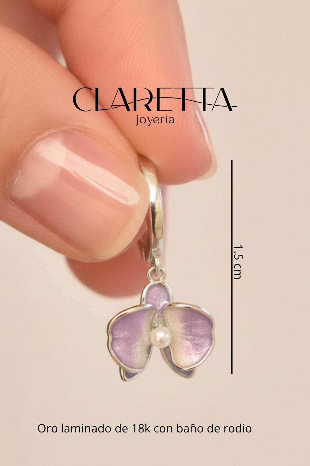 Arracadas de Oro laminado 18k con baño de rodio flor púrpura con perla al centro